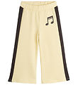 Mini Rodini Sweatpants - Note - Light Yellow w. Brown