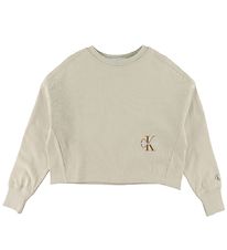 Calvin Klein Peysa - Einrit - Eggjaskurn