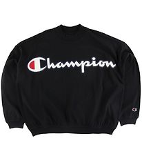 Champion Fashion Pusero - Musta, Logo