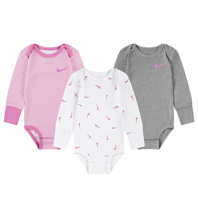 Nike bodysuit pink sale