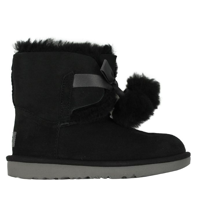 black uggs with pom poms