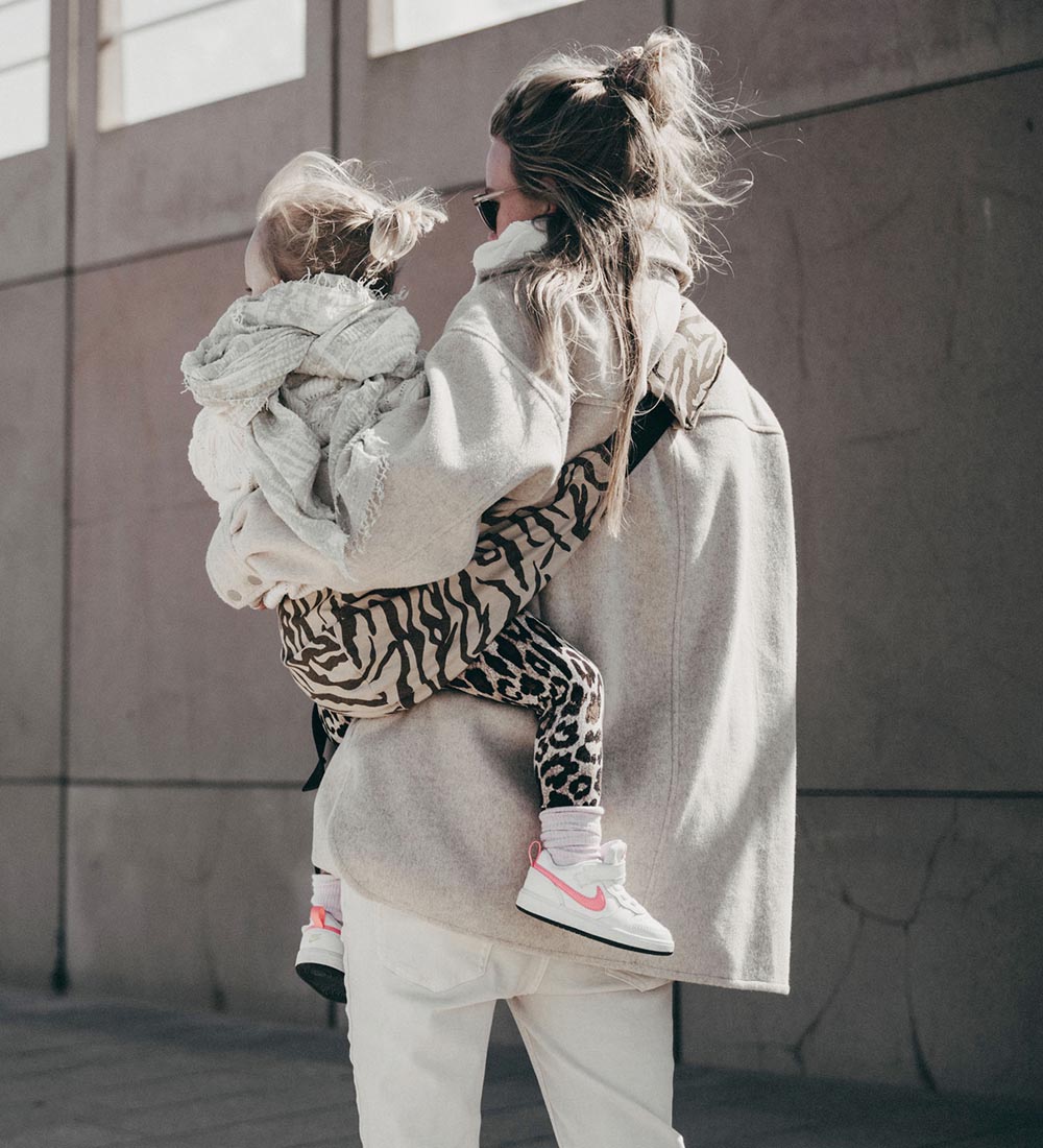 Wildride Babytrage - Das Kleinkind Swing - Zebra