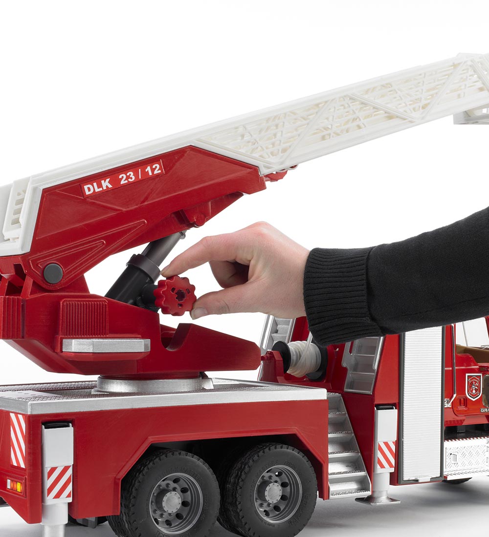 Voiture Bruder - Mack Camion de pompiers en granit av. Lumières
